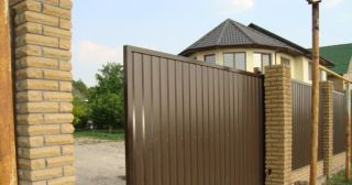Купить откатные ворота из профнастила Железногорск, цена от 1733 руб.